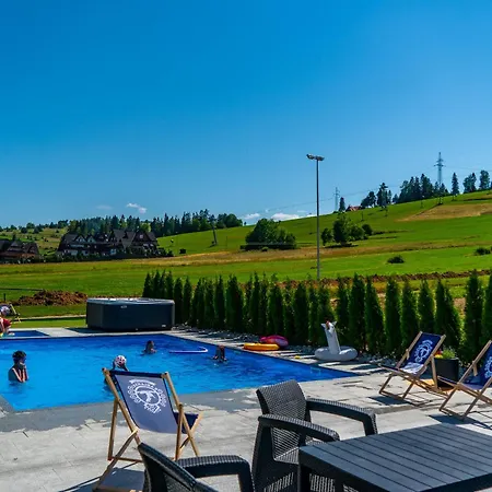 Aparthotel Rabian-ski: Mountain Retreat With Heated Pool & Family Fun